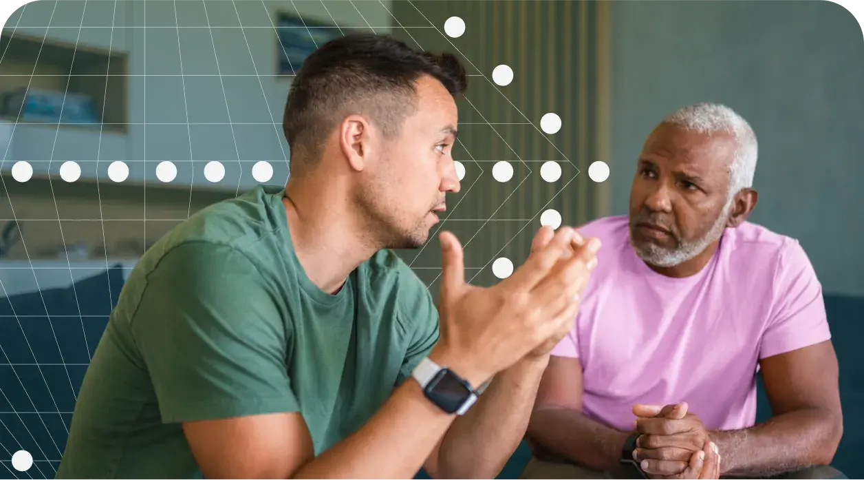 Two people having a conversation, representing behavioral health support and collaborative care.