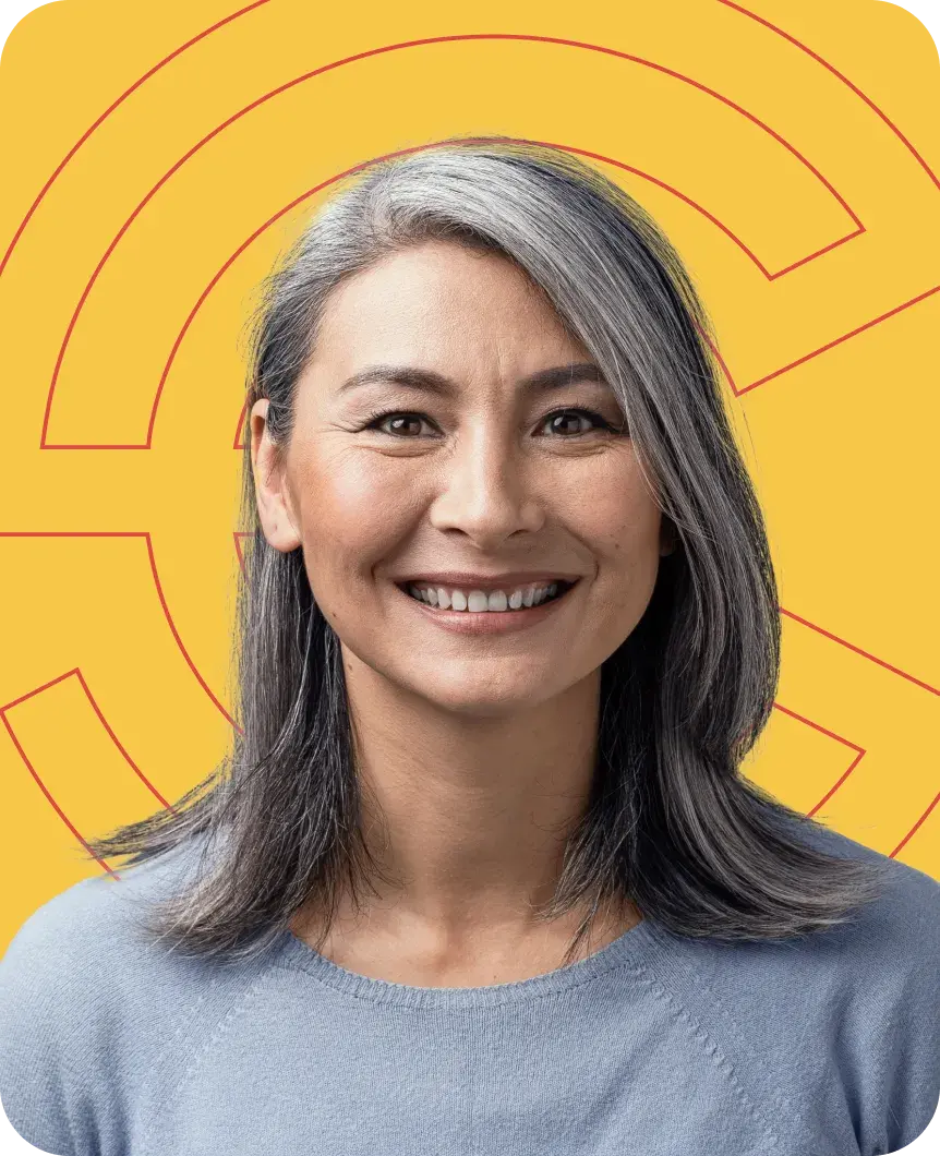 Smiling woman with gray hair wearing a light blue sweater in front of Point C branding on a gold background.