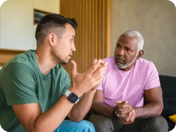 Healthcare provider speaking with a patient during a one-on-one consultation.