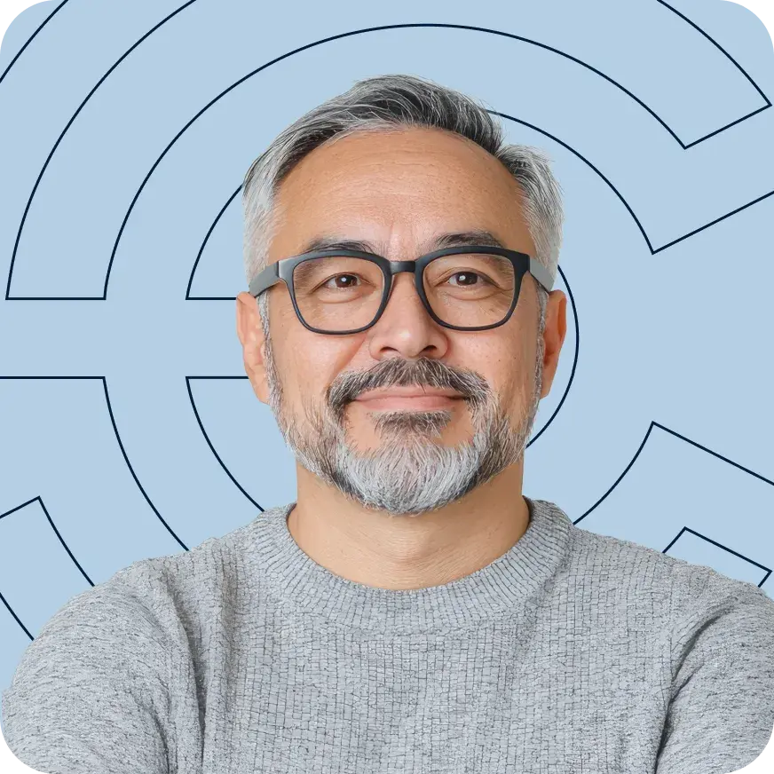 Smiling man in front of Point C branding on a light blue background.